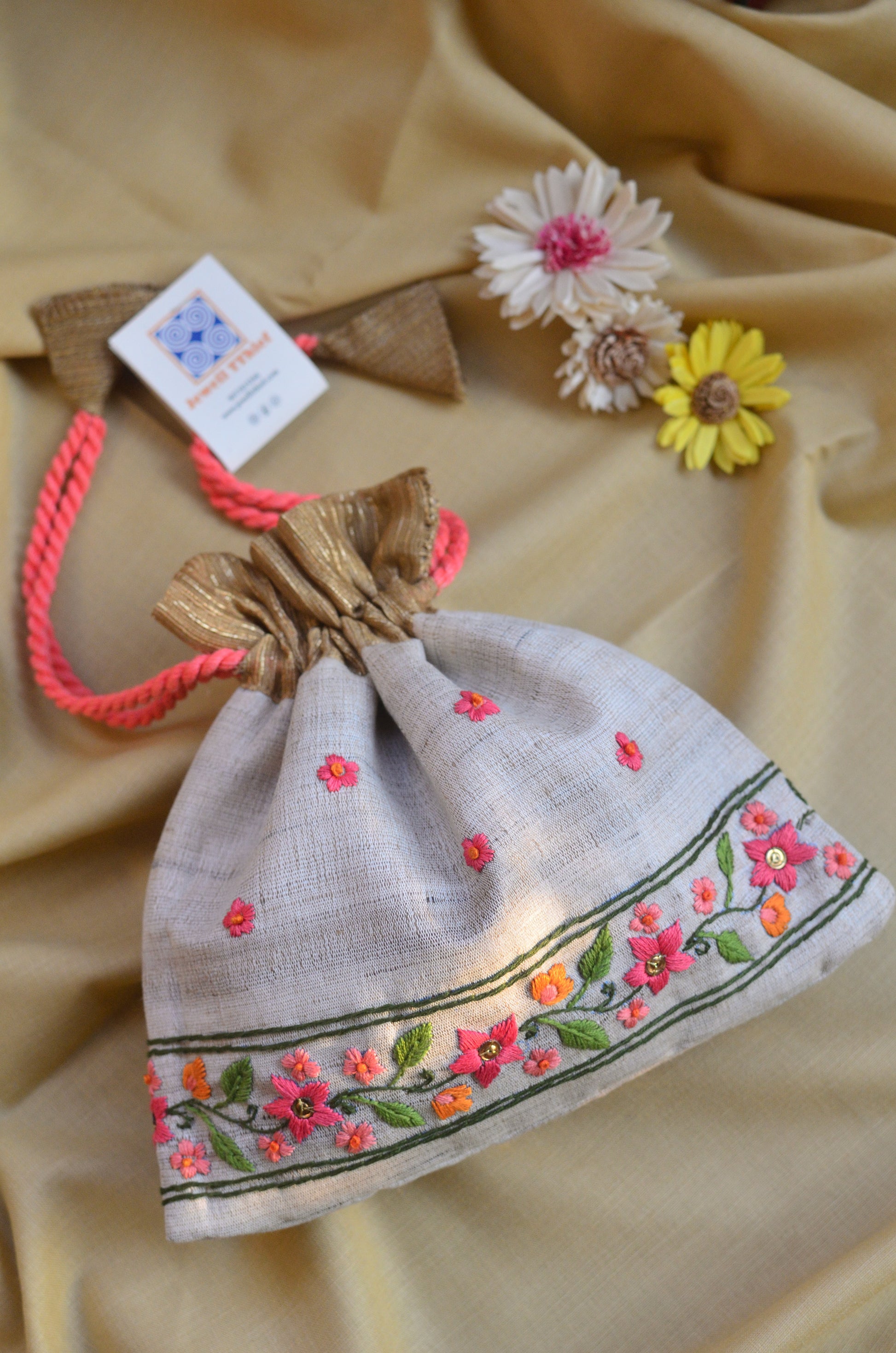 Snigdha - Off white raw silk potli with hand embroidered border image 2