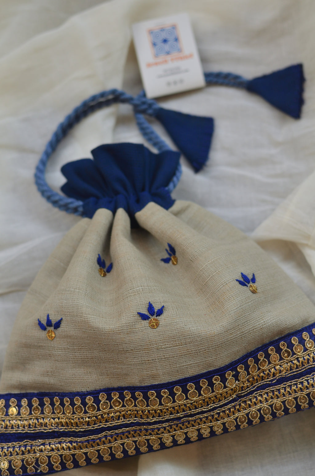 Aparajita - Raw silk potli with zari border image 0