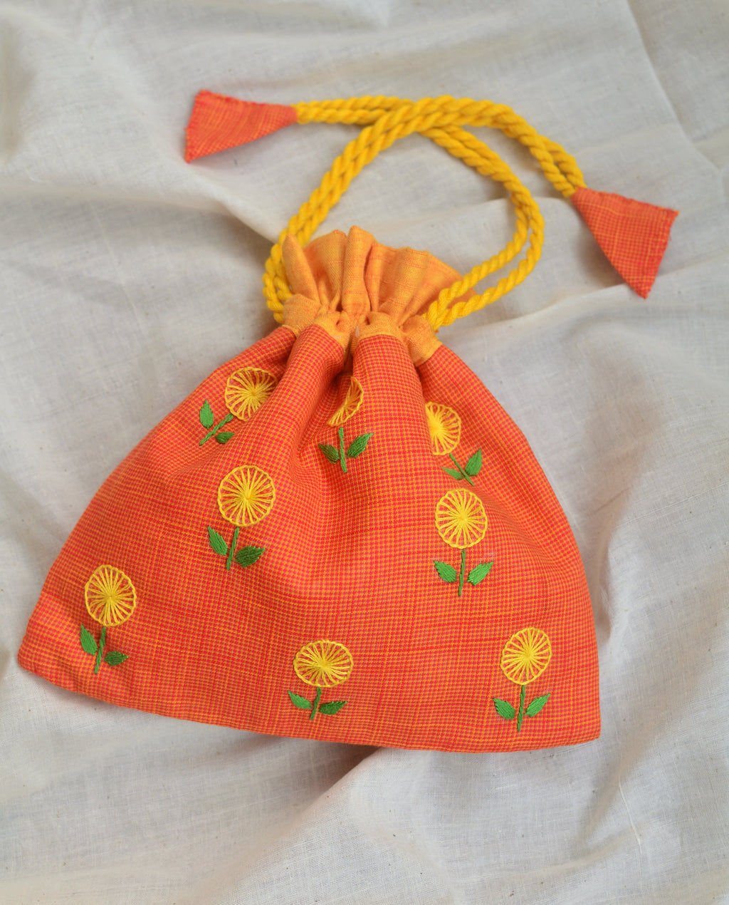 Hand embroidered cotton potli - Yellow flowers on orange base image 0