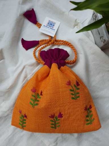 Hand embroidered cotton potli - Yellow image 0