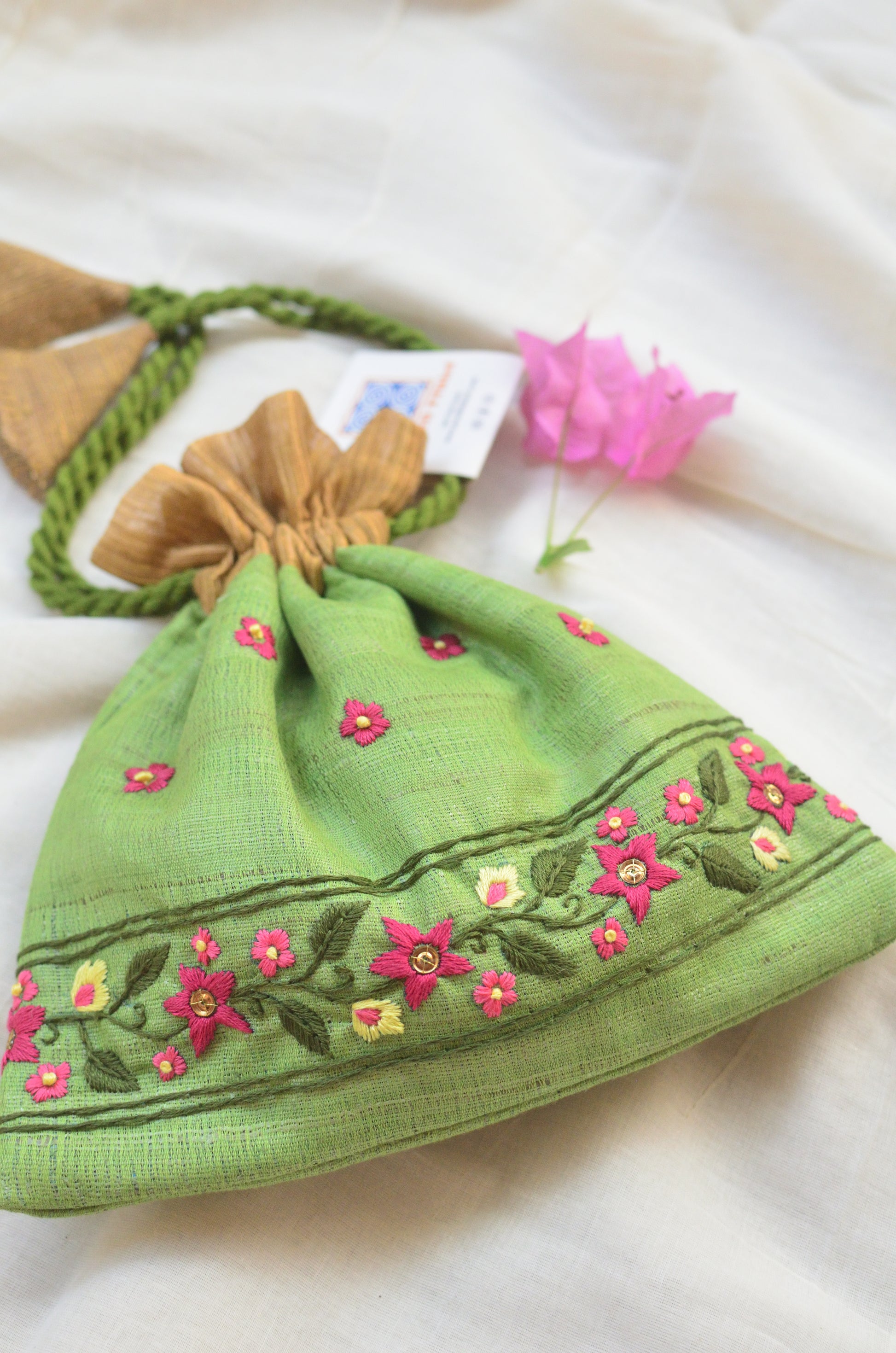 Snigdha - mint green raw silk potli with hand embroidered border image 0