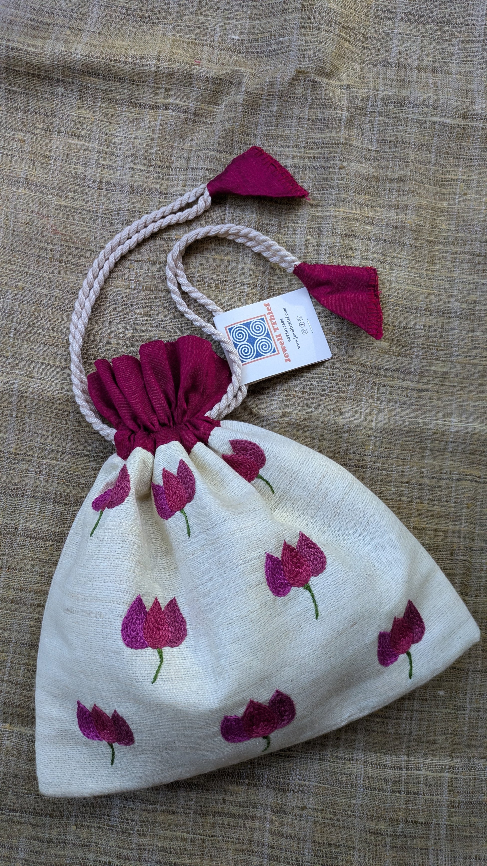 Bougainvillea on white - raw silk potli image 0
