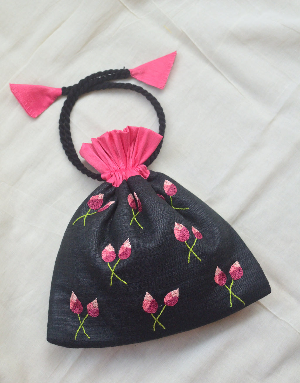 Padma on black - raw silk potli image 0