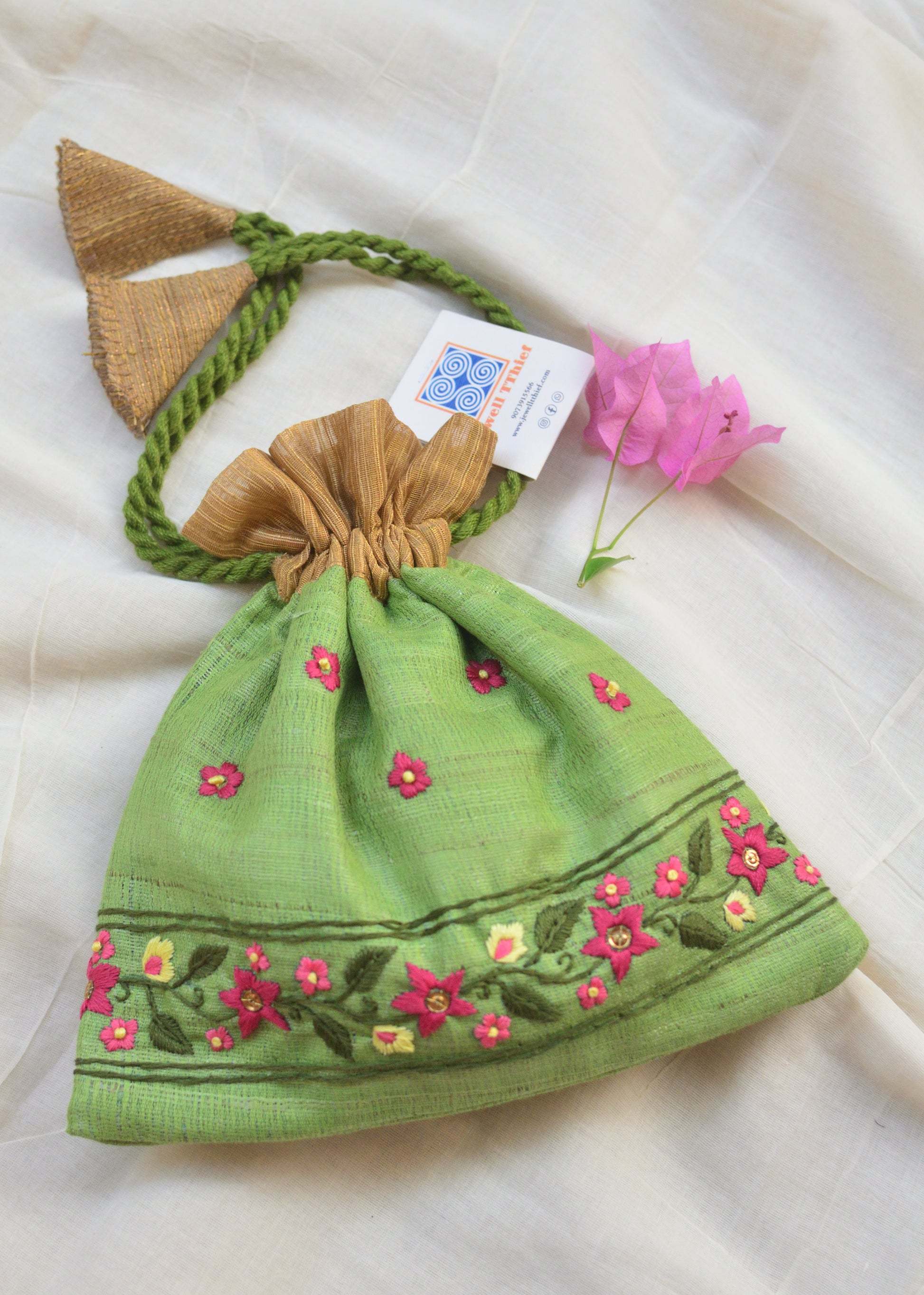 Snigdha - mint green raw silk potli with hand embroidered border image 1