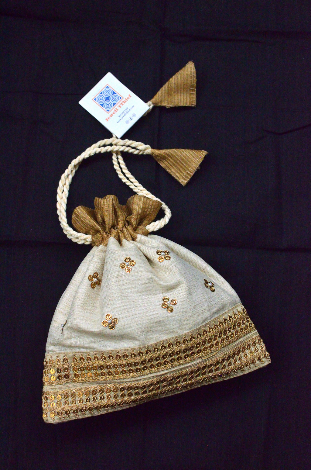 Annapurna - Off while and golden potli image 0