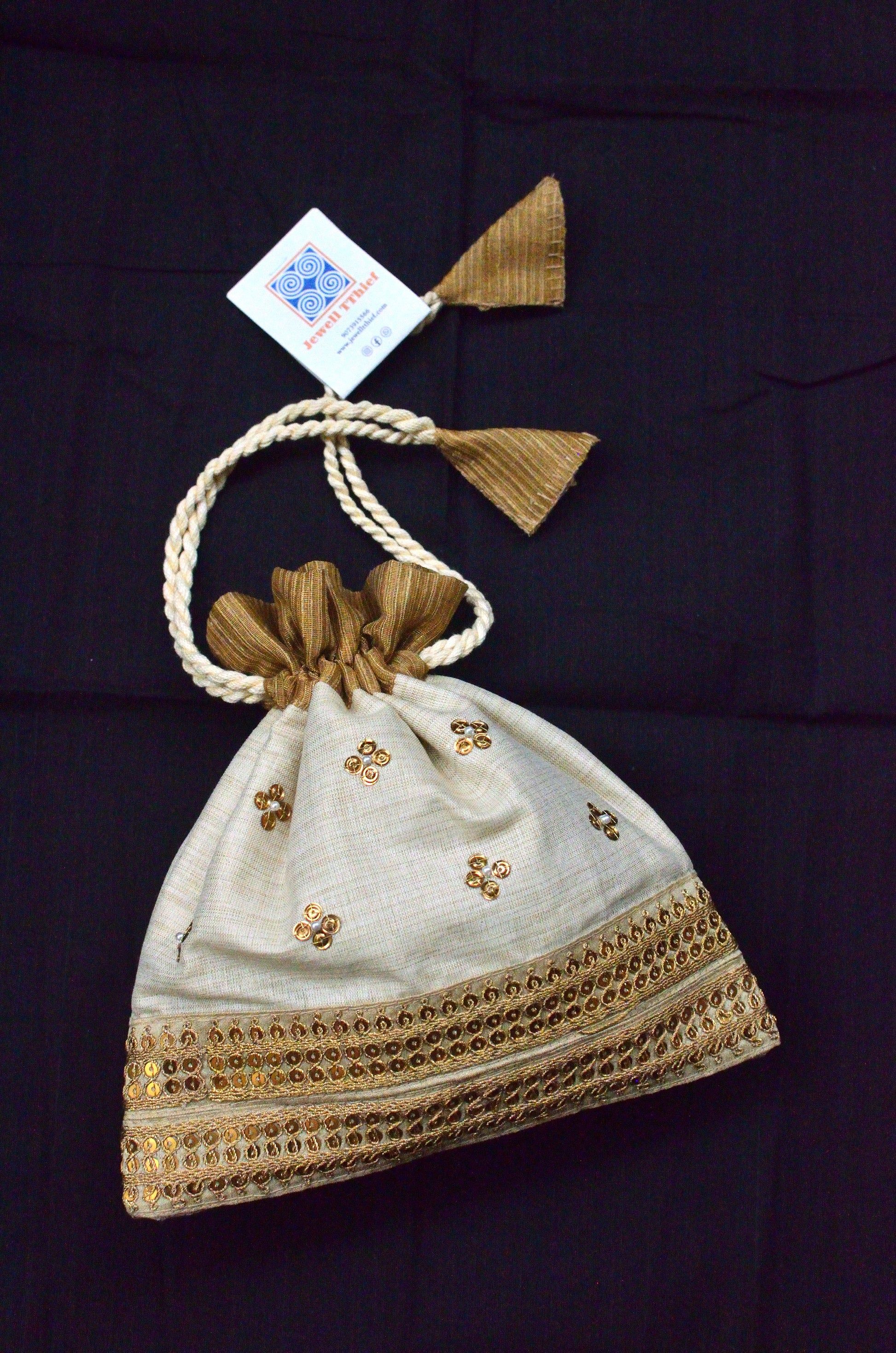 Annapurna - Off while and golden potli image 0