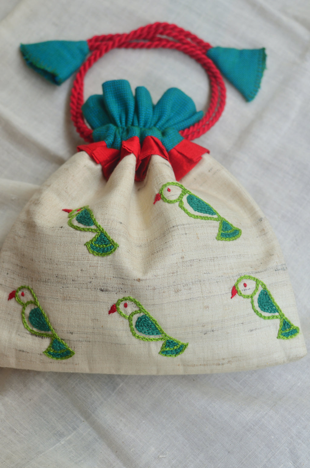 Tia - raw silk potli image 1