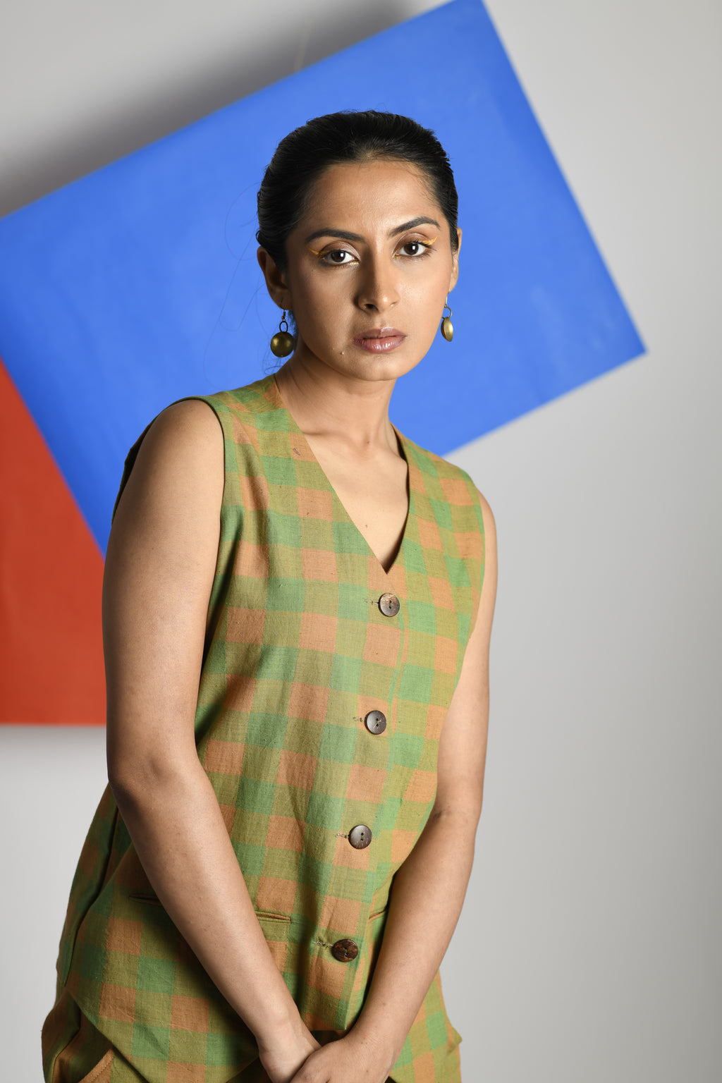 Zircon Gleam Waistcoat Green and pastel orange checks side view