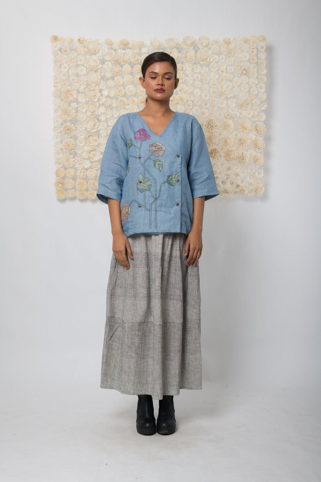 Powder blue floral appliqué V-neck top