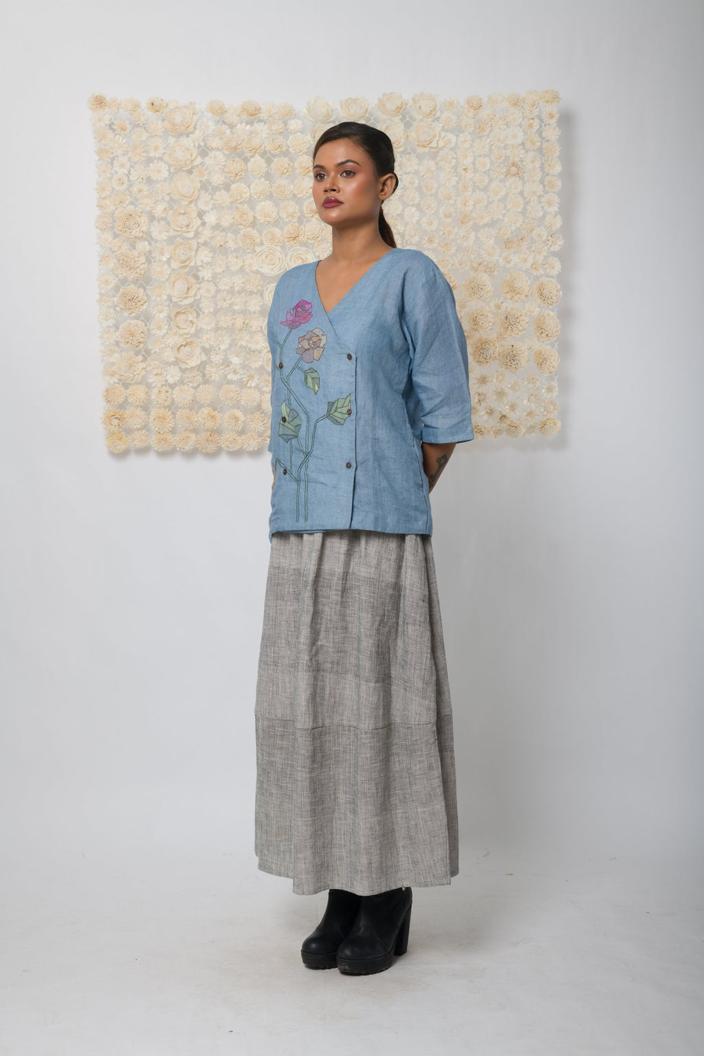 Powder blue floral appliqué V-neck top
