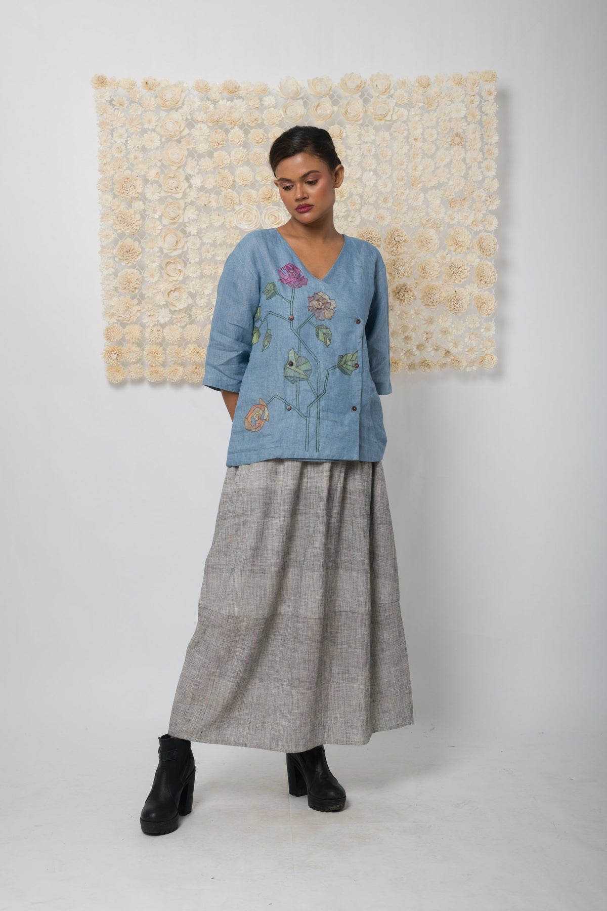 Powder blue floral appliqué V-neck top