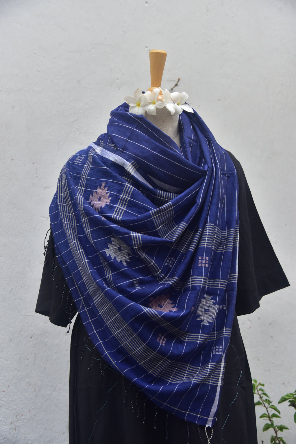 Soft handwoven Jamdani stole in indigo blue front view