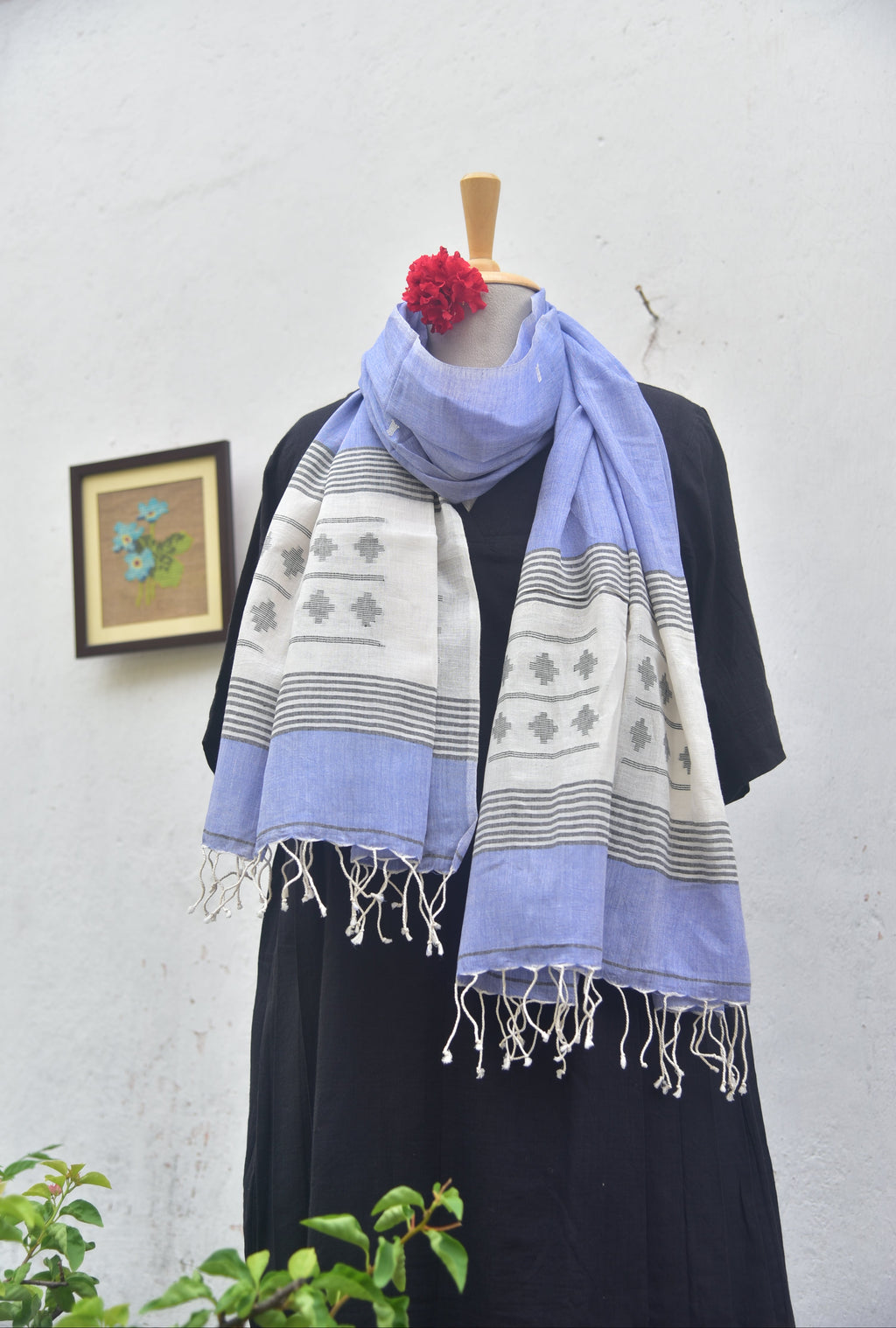 Soft handwoven Jamdani stole in white and blue front view