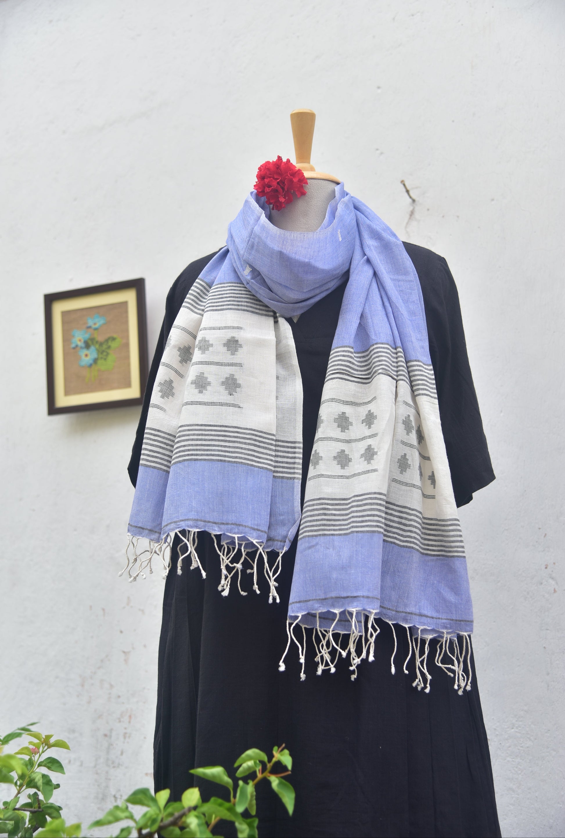 Soft handwoven Jamdani stole in white and blue front view