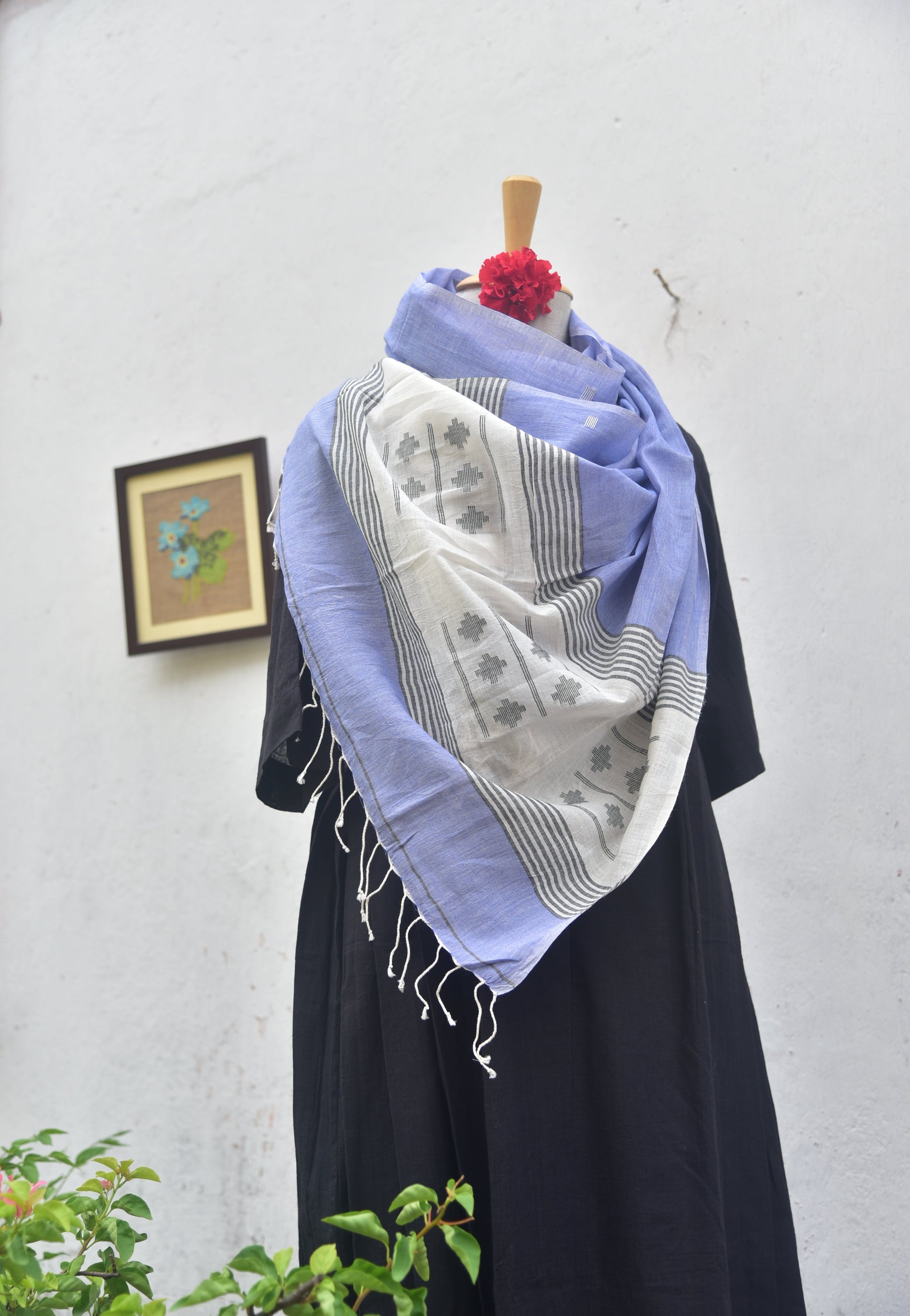 Soft handwoven Jamdani stole in white and blue front view