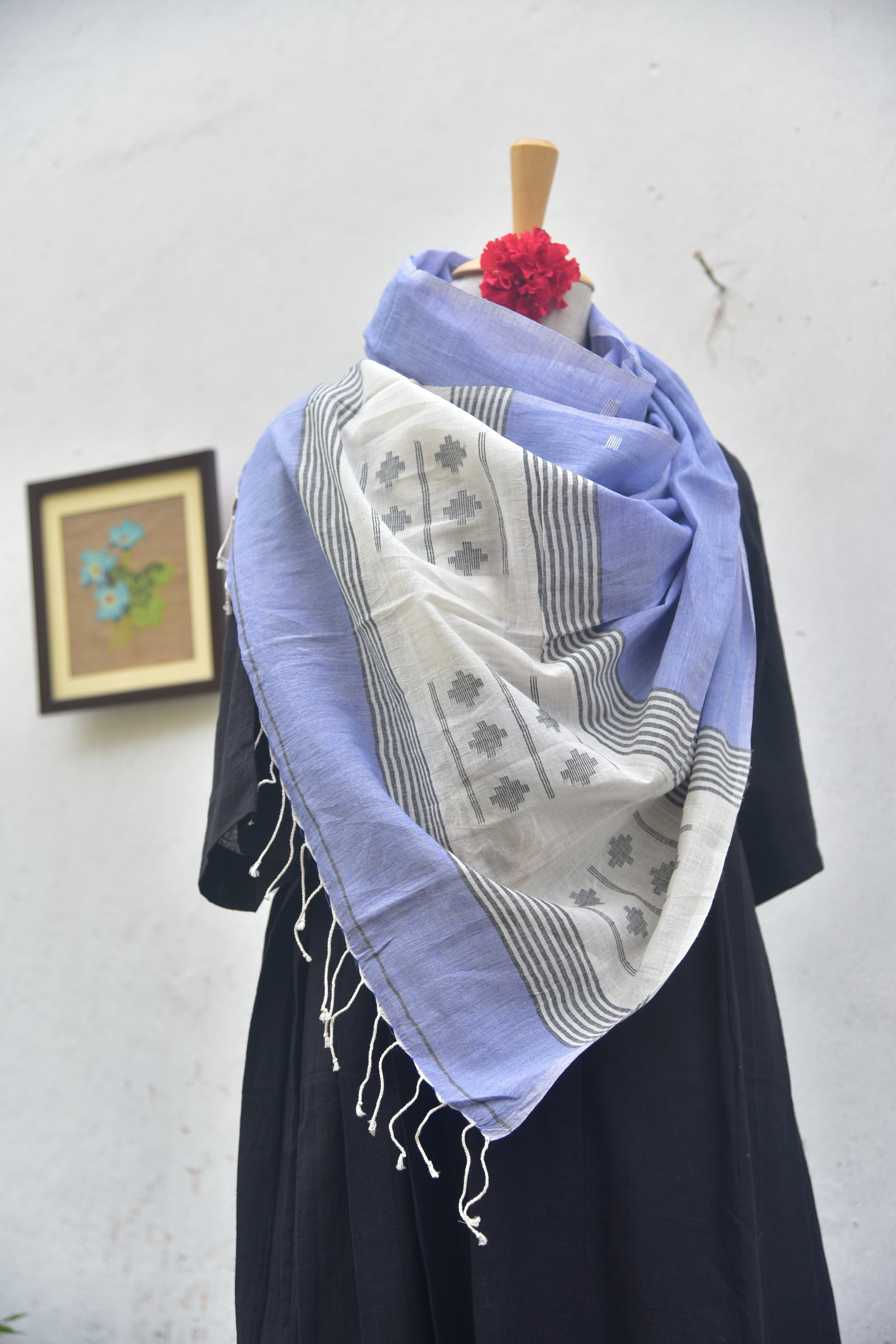 Soft handwoven Jamdani stole in white and blue front view