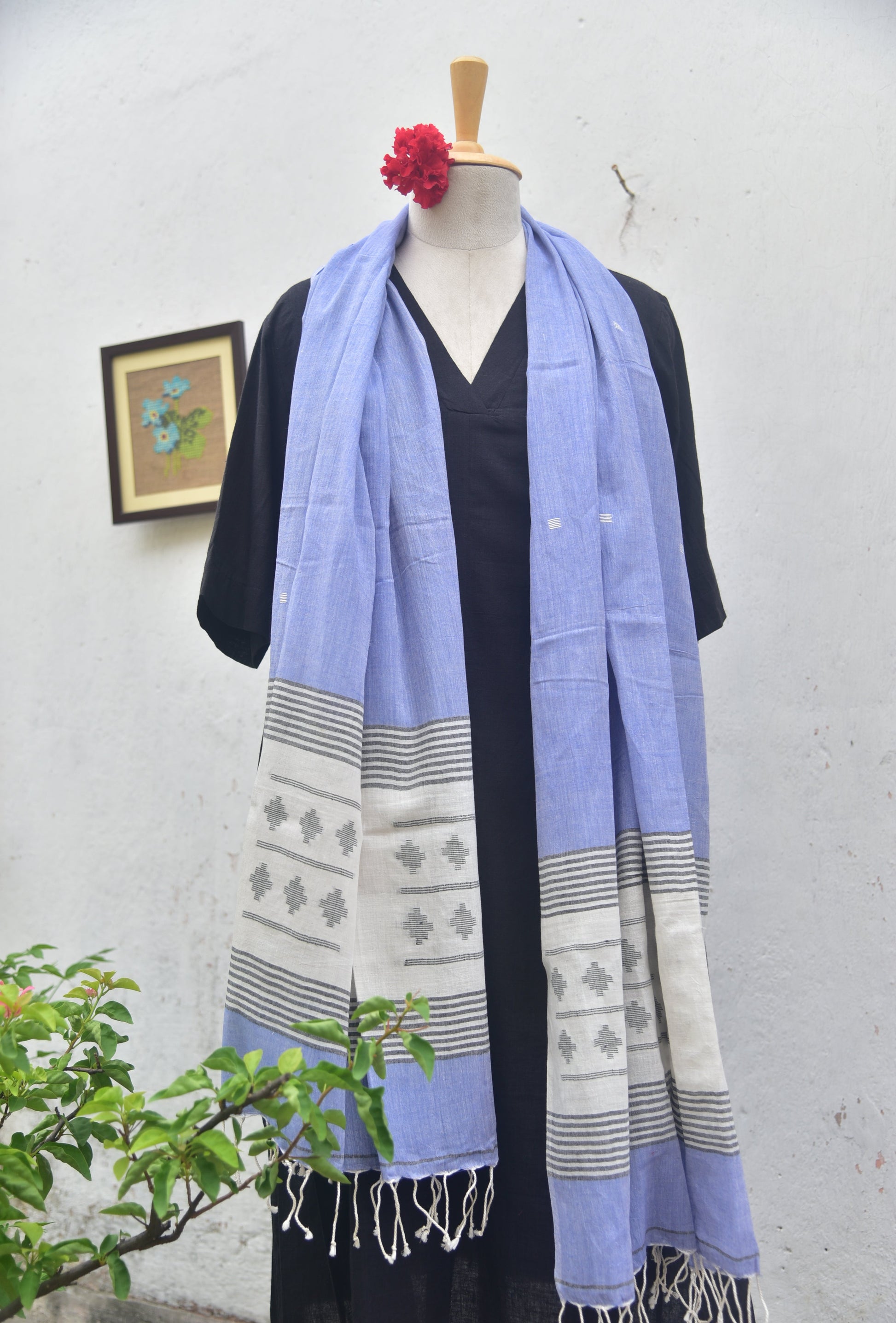 Soft handwoven Jamdani stole in white and blue front view