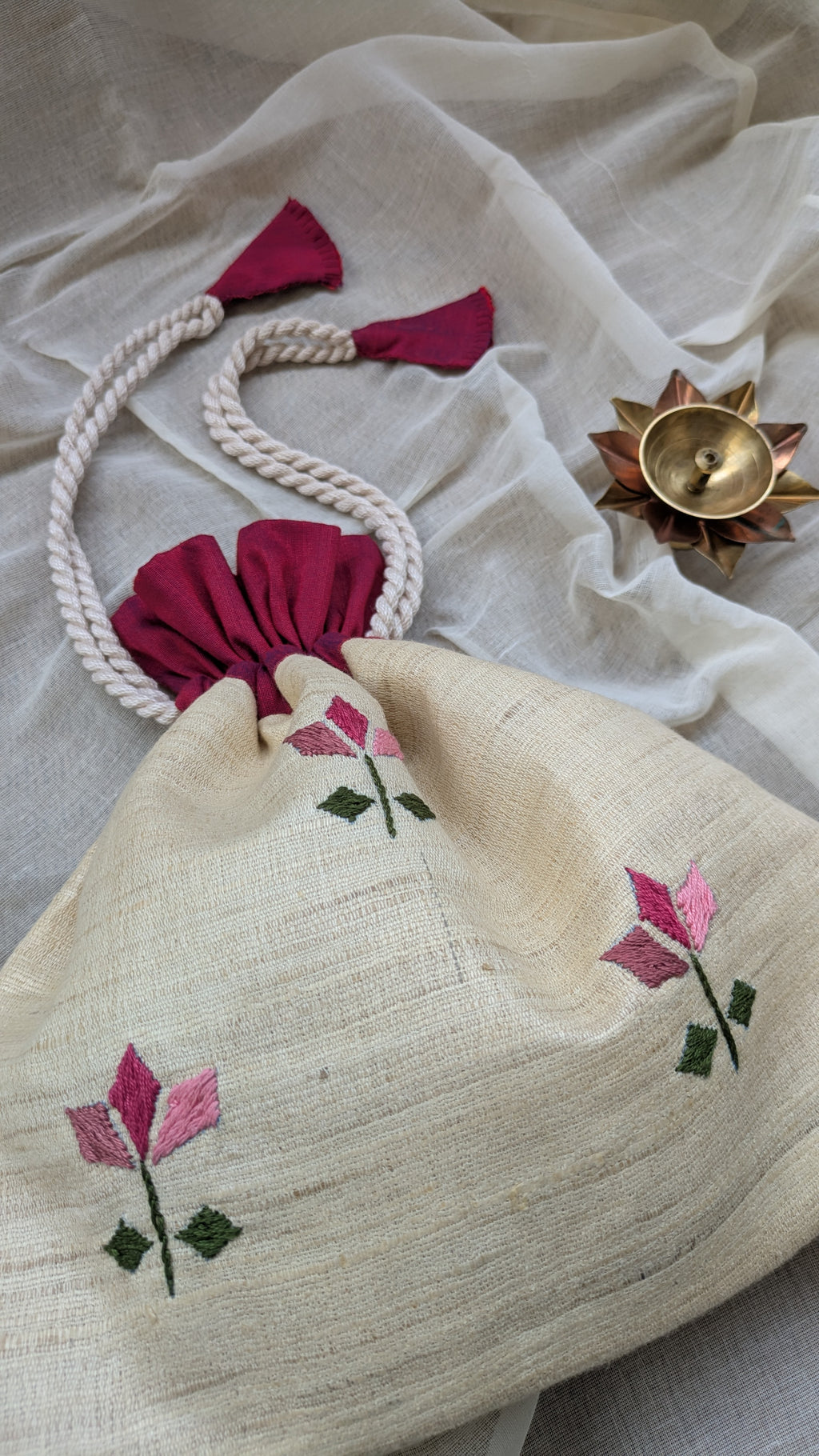 Nayantara Off-white - Hand embroidered Silk Cotton Potli