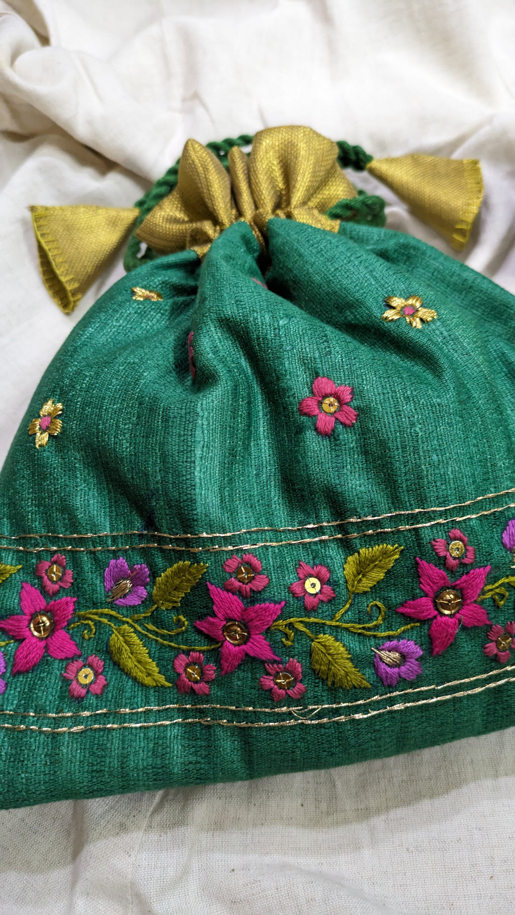 Snigdha - bottle green raw silk potli with hand embroidered border (Zari) image 1